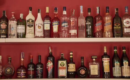 Shelf full of liquor bottles in a pubのeditorial素材