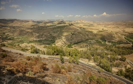 Panorama of the Sicilian hills and the town of Butera in the southern part of Sicilyの写真素材