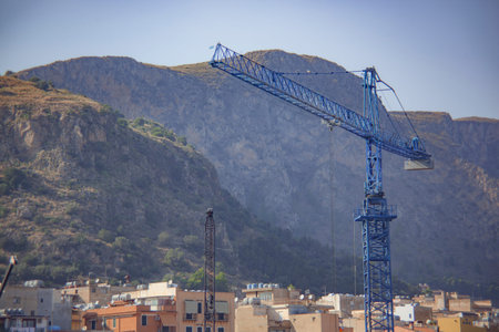 Cranes in Banghera Port at sunsetの写真素材