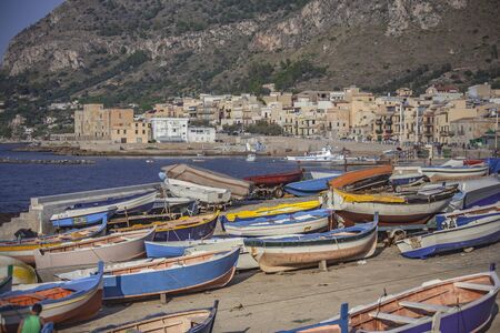 Colorful boats on the beach in Sicilyの写真素材