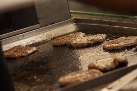 Hamburger on the plate for the coockingの写真素材