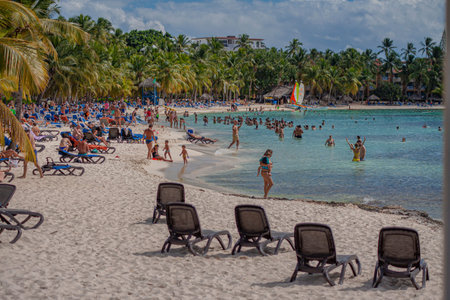 BAYAHIBE, DOMINICAN REPUBLIC 13 DECEMBER 2019: Dominican resort beach with touristsのeditorial素材