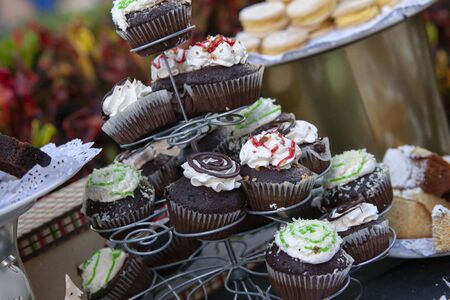 Buffet full of sweet muffins and biscuitsの写真素材