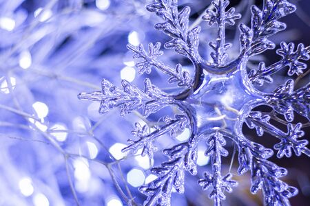 Christmas decoration in the shape of a snowflakeの写真素材