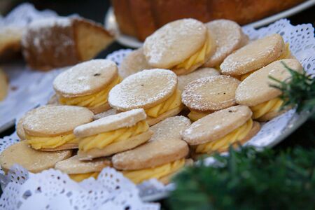 Buffet full of sweet muffins and biscuitsの写真素材