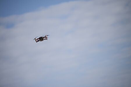 Small commercial Drone in Flightの写真素材