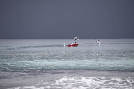 BAYAHIBE, DOMINICAN REPUBLIC 4 JANUARY 2020: Dominican boats in seaの写真素材