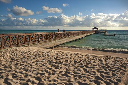 Pier in Bayahibe at sunset in Domonican Republicの写真素材