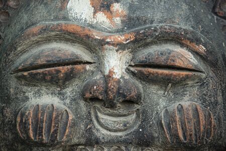 Historic Taino statue with face in Dominican Republicの写真素材
