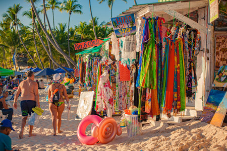 DOMINICUS, DOMINICAN REPUBLIC 6 FEBRAURY 2020: Selling clothes on Dominicus beachのeditorial素材