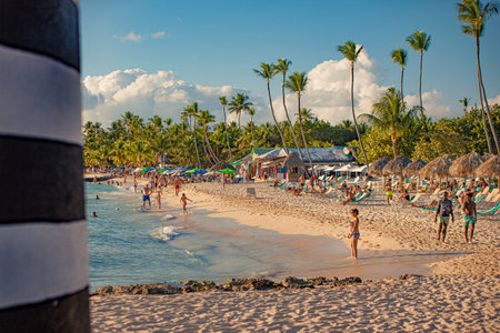 DOMINICUS, DOMINICAN REPUBLIC 6 FEBRAURY 2020: Dominicus beach full of tourists at sunsetのeditorial素材