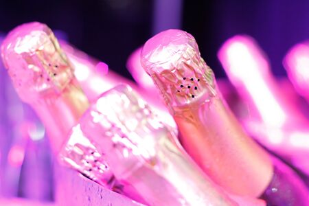 Champagne bottles ready for the party at buffetの写真素材