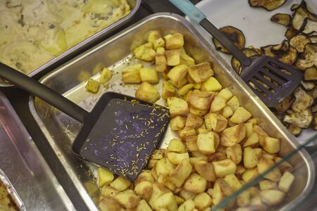 Rotisserie counter with dishes ready to be purchased and exportedの写真素材