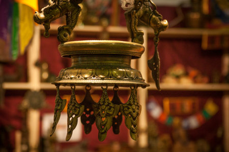Oriental ornamental object in golden metal for exposition