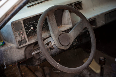 Old abandoned and rusty car interior detailの写真素材