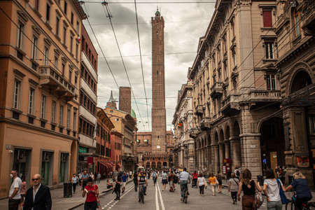 BOLOGNA, ITALY 17 JUNE 2020: Via Rizzoli in Bologna, Italy with his historical Building and the Asinelli Tower at the endのeditorial素材