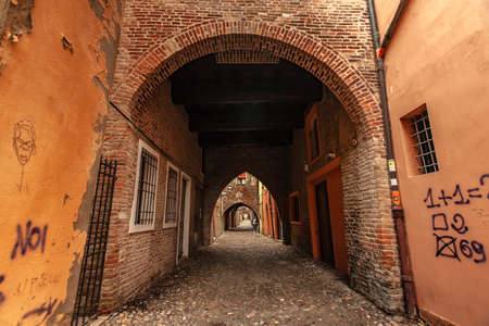 FERRARA, ITALY 29 JULY 2020: Via delle Volte in Ferrara in Italy a famous alley in the Historical italian cityのeditorial素材
