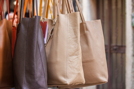 Detail of an Exhibition of hand made leather bags in a shop in Italyの写真素材