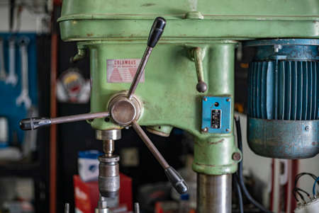MILAN, ITALY 14 JULY 2021: Drill press detail in a workshopのeditorial素材