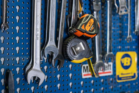 MILAN, ITALY 14 JULY 2021: Detail of Wrench hung on the counter in the workshopのeditorial素材