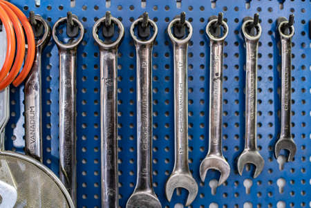 MILAN, ITALY 14 JULY 2021: Detail of Wrench hung on the counter in the workshopのeditorial素材