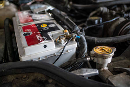MILAN, ITALY 2 AUGUST 2021: Car battery in the engineの写真素材