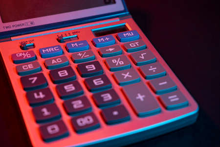 Calculator keyboard detail with dark backgroundの写真素材