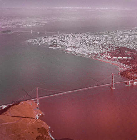SAN FRANCISCO, UNITED STATES MAY 1970: Golden gate bridge aerial view in 70'sのeditorial素材