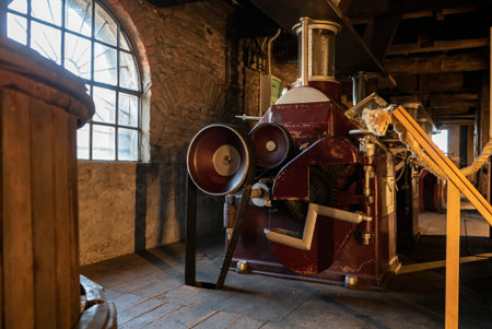 Interior shot of an old historic factory with machinery