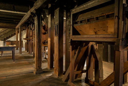Interior shot of an old historic factory with machineryのeditorial素材