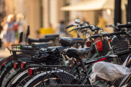 Rovigo, Italy 29 july 2022: Bicycles bike sharing detailのeditorial素材