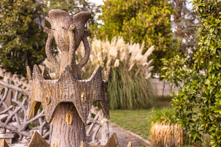 concrete architecture fountain in the garden with green tree and walkwayの写真素材