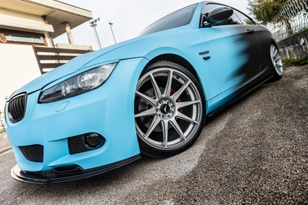 Milan, Italy 13 November 2022: Bmw 3 series Tuned luxury car parked in the drivewayのeditorial素材