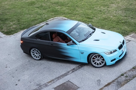 Milan, Italy 13 November 2022: Bmw Sport tuned car in the city portrait shot. Car Tuning show.のeditorial素材