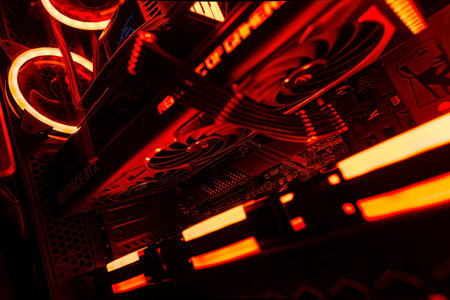 Milan, Italy 14 april 2023: Showcase the latest technology with this detailed image of the new 12-pin GPU cabling in a beautifully illuminated gaming PC setup.のeditorial素材