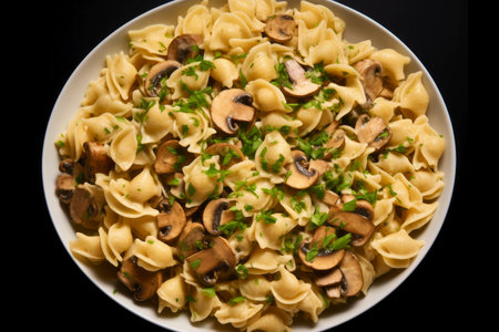 A mouthwatering composition of pasta combined with flavorful mushrooms, elegantly presentedの素材
