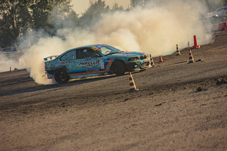 Villamarzana, 10 September 2023: Intense car race capturing the thrill of drifting on a challenging circuit.のeditorial素材