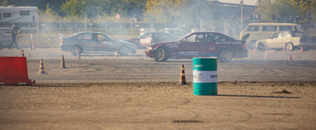 Villamarzana, 10 September 2023: Intense car race capturing the thrill of drifting on a challenging circuit.のeditorial素材