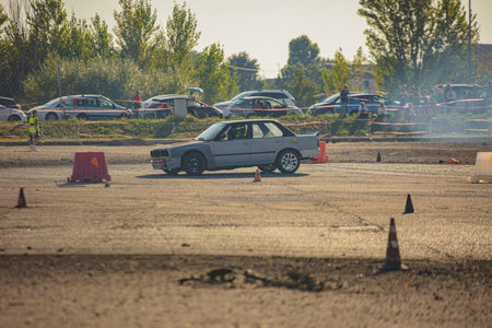 Villamarzana, 10 September 2023: Intense car race capturing the thrill of drifting on a challenging circuit.のeditorial素材