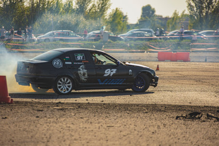 Villamarzana, 10 September 2023: Intense car race capturing the thrill of drifting on a challenging circuit.のeditorial素材