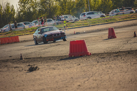 Villamarzana, 10 September 2023: Intense car race capturing the thrill of drifting on a challenging...