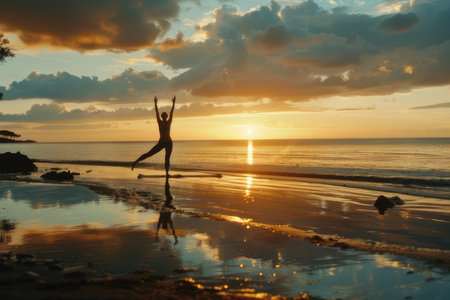 Yoga session on peaceful beach at dawn emphasizes mindfulness, fitness, and connection with nature.の素材