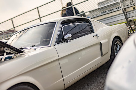 Exposed vintage American car at a show, capturing the essence of classic automotive excellence.