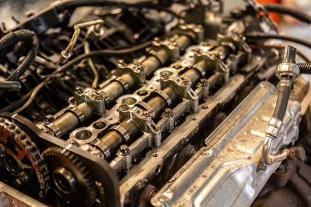 An intricate close-up view of a powerful engine within a vehicle, showcasing the intricate details...