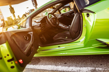 Adria, Italy 30 July 2024: Interior view of a Lamborghini with the door open showing the seats and dashboardのeditorial素材