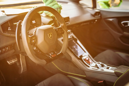 Adria, Italy 30 July 2024: Interior dashboard view of a Lamborghini with a focus on the steering wheel and controlsのeditorial素材