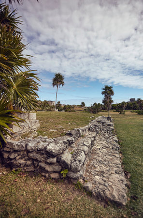 Ancient Mayan ruins stand overlooking the Caribbean Sea in Tulum, Mexico.