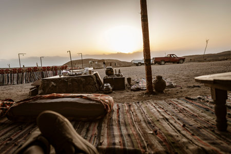 Tranquil scene inside a desert camp in Marsa Alam, Egypt, during a breathtaking sunset, offering...