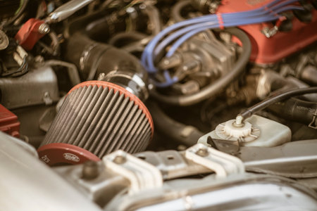 Rome, Italy 17 June 2025, clean air filter installed in a car engine compartment, ensuring proper engine function and performanceの写真素材