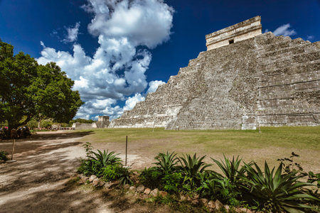 Kukulkan pyramid, also known as el castillo, stands tall in Chichen Itza, Yucatan, Mexico, a...